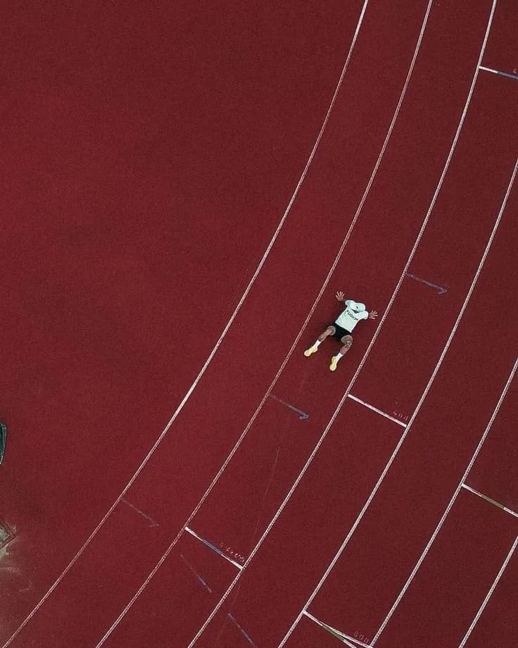 Runners training on a track